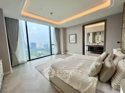 Luxurious bedroom with stunning city view and elegant decor