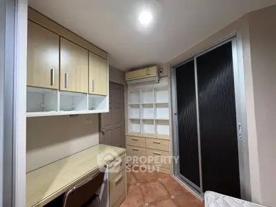 Compact study room with built-in storage and air conditioning