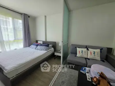 Cozy bedroom with modern decor and natural light