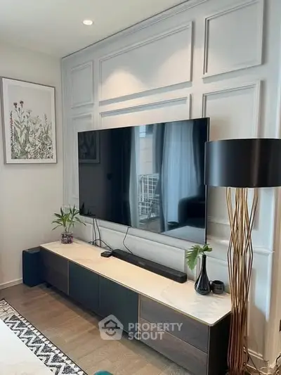 Stylish living room with modern TV setup and elegant decor