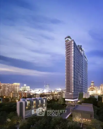 Stunning high-rise building with city skyline view at dusk, perfect for urban living.