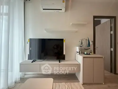 Modern living room with sleek TV setup and minimalist decor