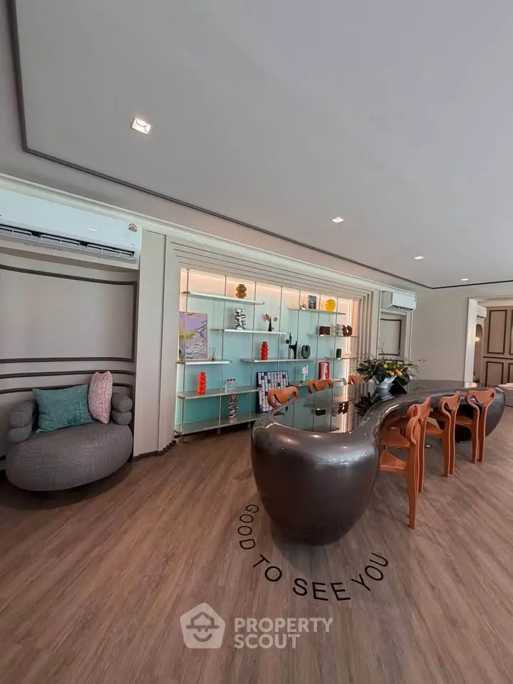 Stylish modern living room with unique furniture and elegant decor, perfect for contemporary living.