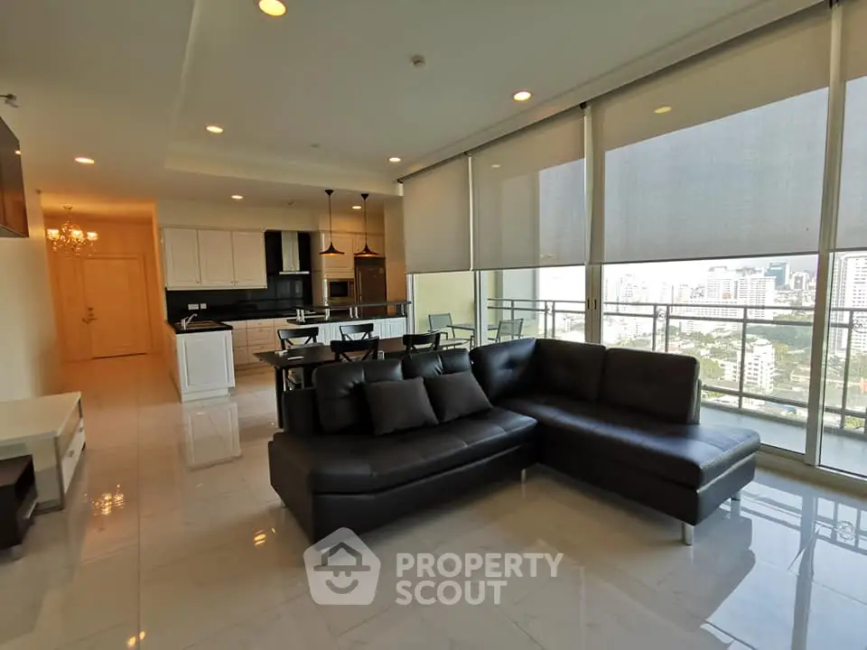Spacious modern living room with city view and open kitchen layout