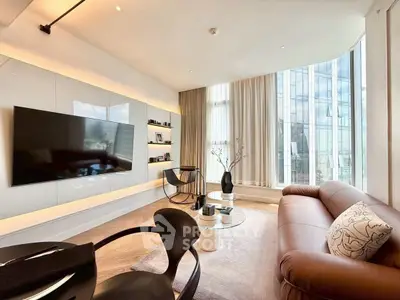 Luxurious modern living room with floor-to-ceiling windows and elegant decor