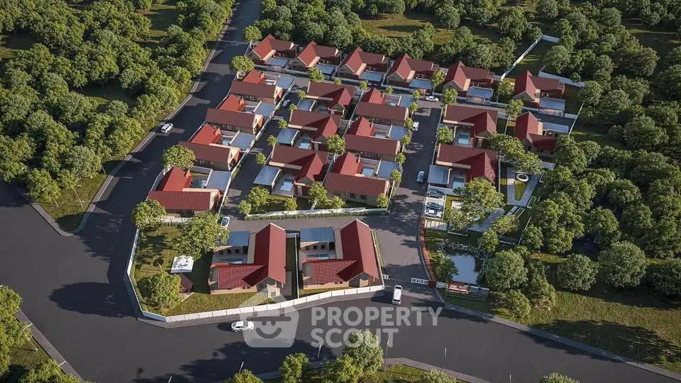 Aerial view of modern residential complex with red-roofed houses surrounded by lush greenery.