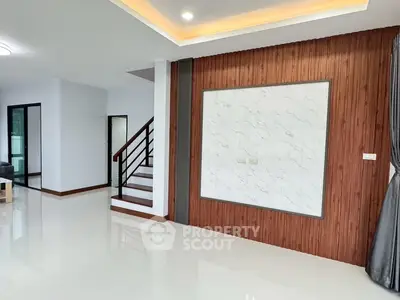Modern interior with elegant staircase and stylish wall paneling
