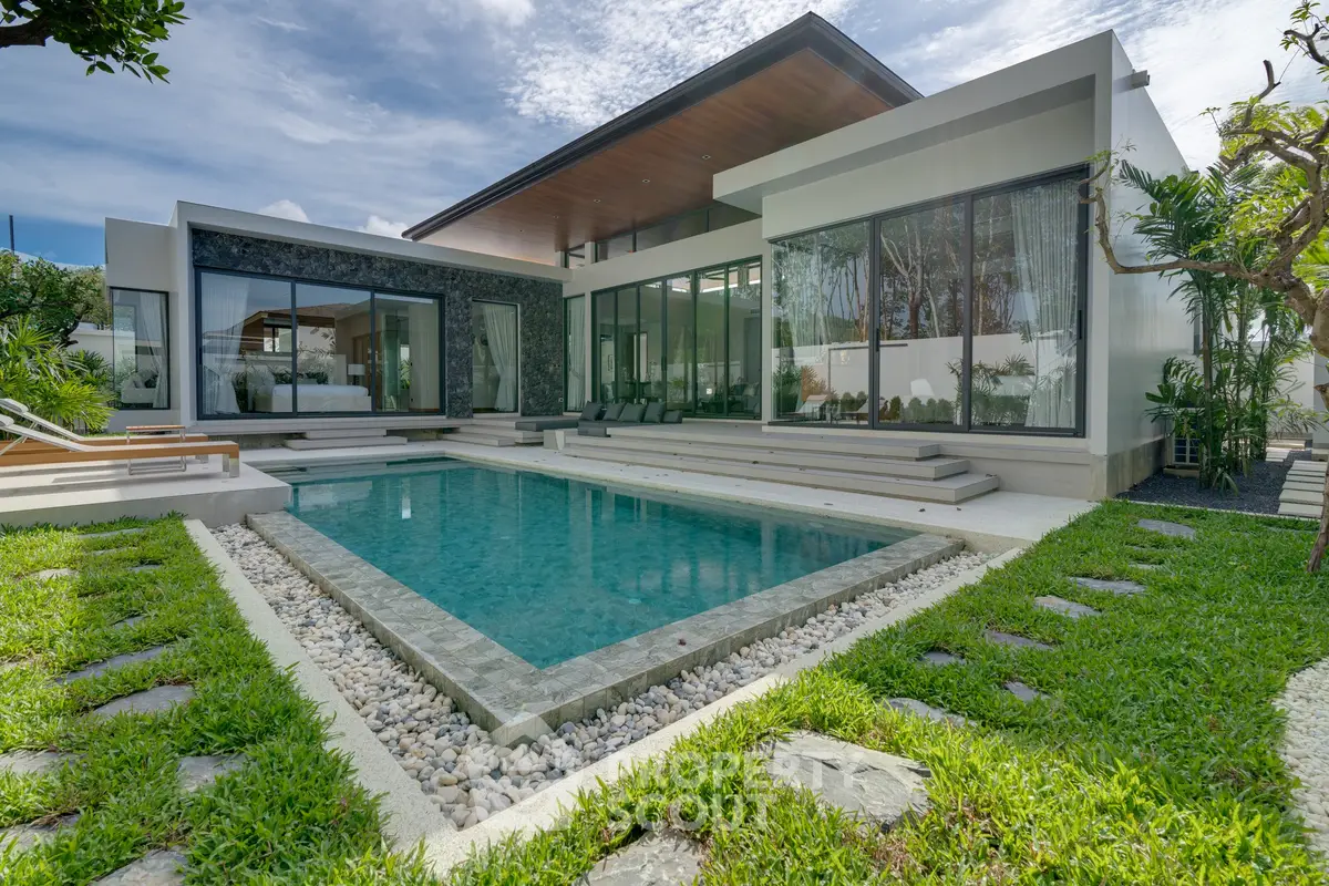 Luxurious modern villa with private pool and lush garden, perfect for serene living.