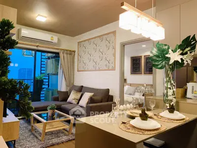 Modern living room with stylish decor and open layout in a high-rise apartment.