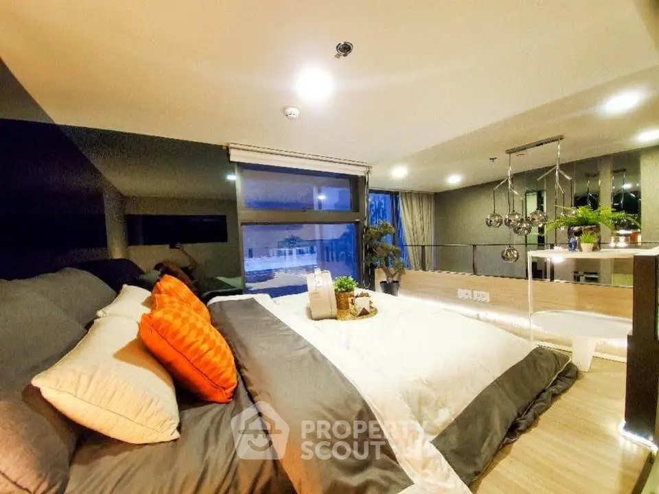 Luxurious modern bedroom with stylish decor and large windows