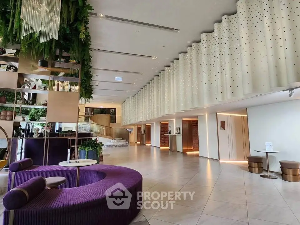 Luxurious modern lobby with elegant seating and unique architectural design