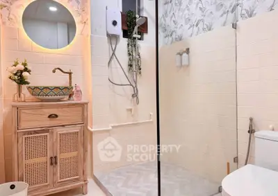 Charming bathroom with stylish vanity and modern shower design