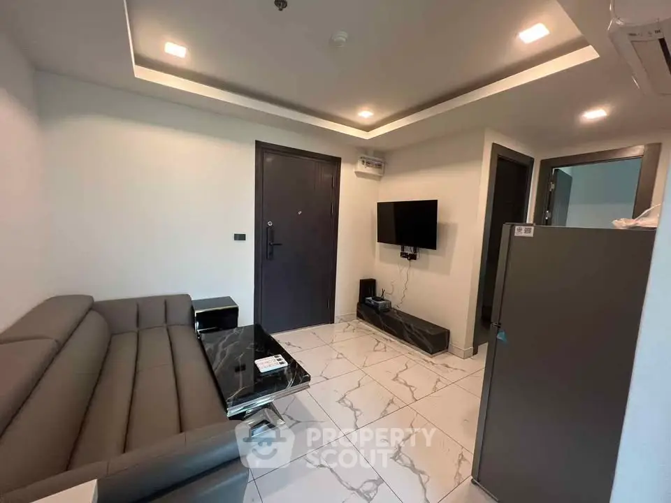 Modern living room with sleek furniture and marble flooring