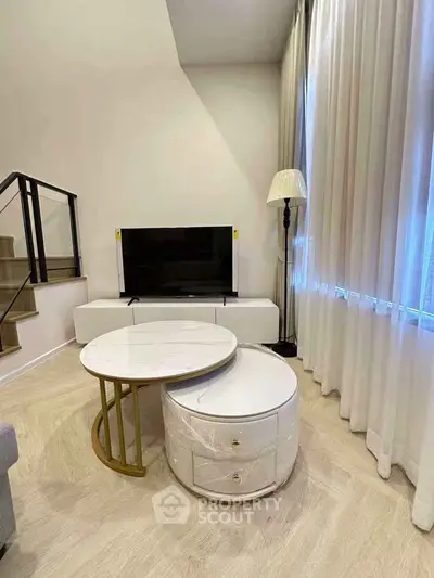 Modern living room with stylish furniture and elegant decor