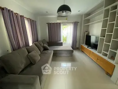 Spacious living room with modern furniture and natural light