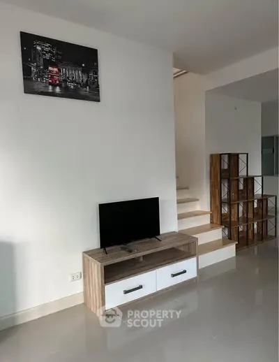 Modern living room with sleek TV stand and stylish decor