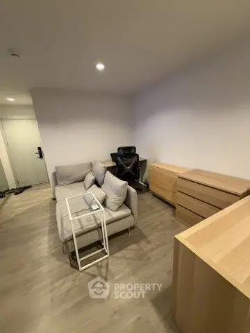 Modern living room with sleek furniture and minimalist design