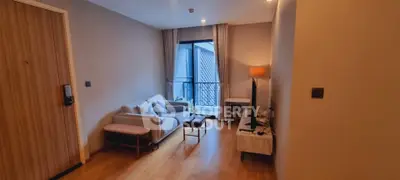 Cozy living room with modern decor and small balcony view