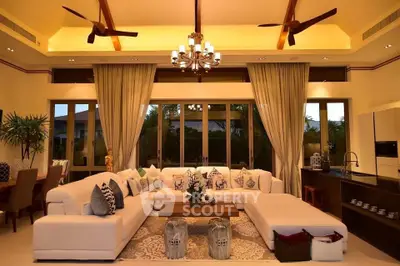 Luxurious living room with elegant decor and spacious seating area