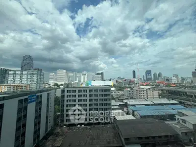 Stunning cityscape view from high-rise building showcasing urban skyline and vibrant architecture.