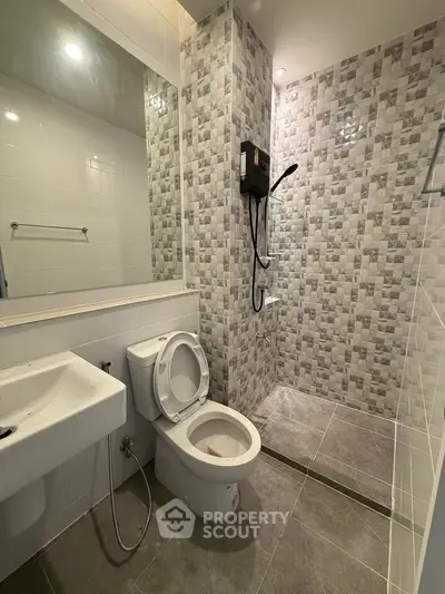 Modern bathroom with stylish tile design and walk-in shower