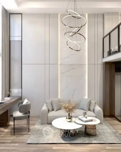 Luxurious modern living room with high ceiling and elegant chandelier