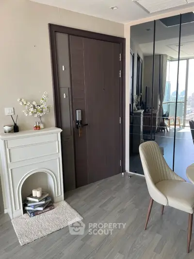 Modern apartment entrance with elegant decor and city view