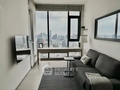 Modern living room with stunning city view and sleek furnishings