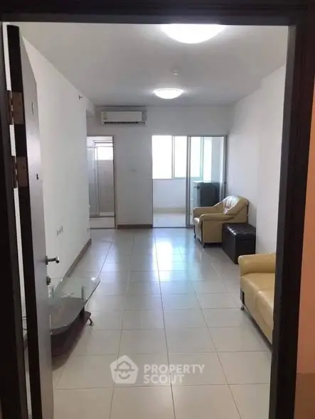 Spacious living room with modern furniture and natural light