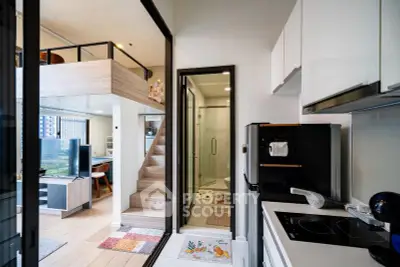 Modern loft apartment with open kitchen and stylish interior design