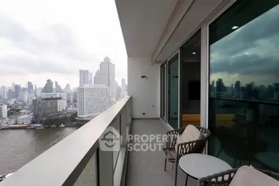 Stunning high-rise balcony with breathtaking city and river views, perfect for urban living.