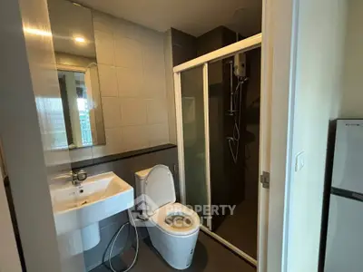 Modern bathroom with sleek shower and contemporary fixtures