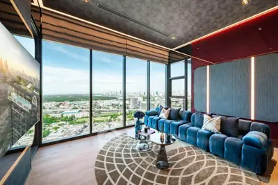 Luxurious living room with panoramic city views and modern decor