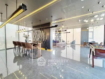 Luxurious modern living room with elegant lighting and stylish decor, perfect for entertaining.