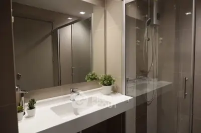 Modern bathroom with sleek design and glass shower enclosure
