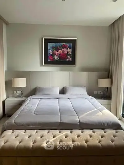 Luxurious bedroom with elegant decor and plush bedding, perfect for relaxation.
