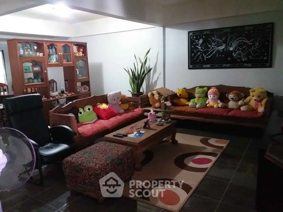 Cozy living room with plush toys and stylish decor