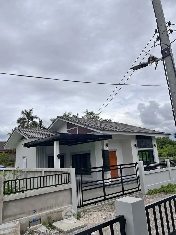 Charming single-story house with modern design and spacious yard, perfect for family living.