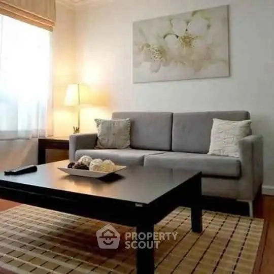Stylish living room with modern sofa and elegant decor, perfect for relaxation and entertaining.