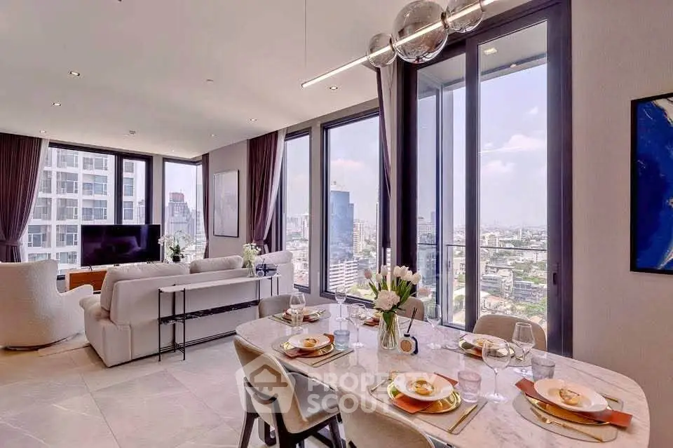 Luxurious living room with panoramic city views and elegant dining area in modern high-rise apartment.