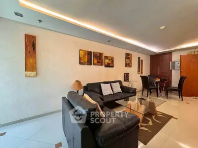 Stylish living room with modern decor and elegant lighting in a contemporary apartment.