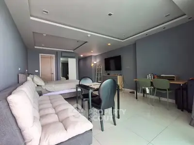Spacious modern studio apartment with open layout and stylish furnishings