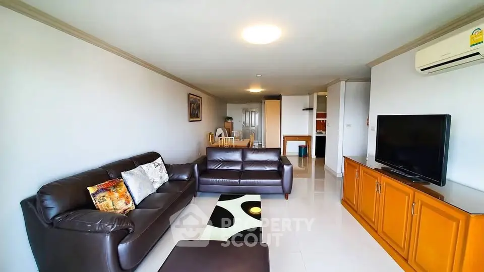 Spacious living room with modern furniture and sleek design