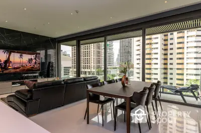 Luxurious open-plan living space with sleek furnishings and floor-to-ceiling windows offering an urban view, perfect for upscale city living.