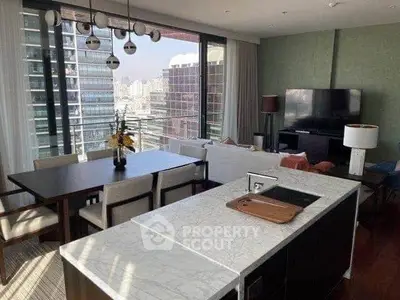 Luxurious open-plan living room with city view and modern furnishings