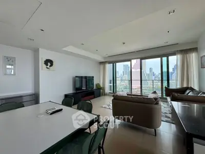 Spacious modern living room with city view and elegant furnishings