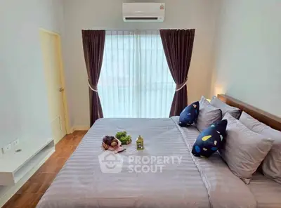 Cozy bedroom with modern decor and natural light