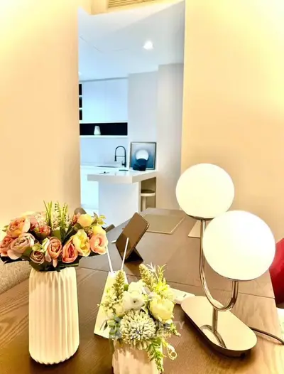 Modern interior with elegant decor and stylish lighting in a cozy living space.
