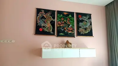 Stylish living room wall with dragon art and modern shelf