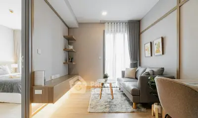 Modern living room with sleek furniture and natural light